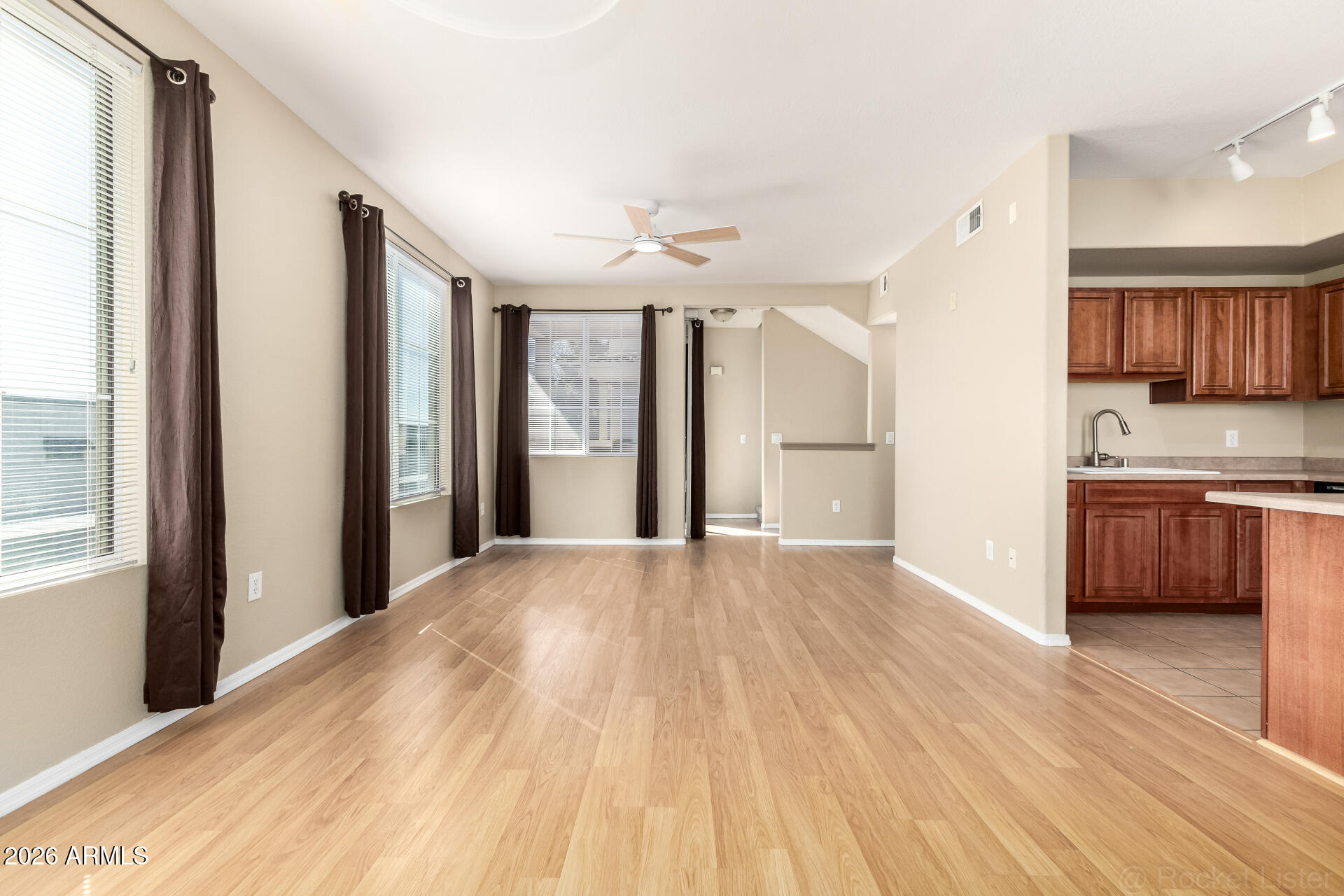 18250 North Cave Creek Road, Unit 198 Phoenix, AZ 85032 - Photo 5 of 30 a view of a kitchen with a sink and a stove top oven