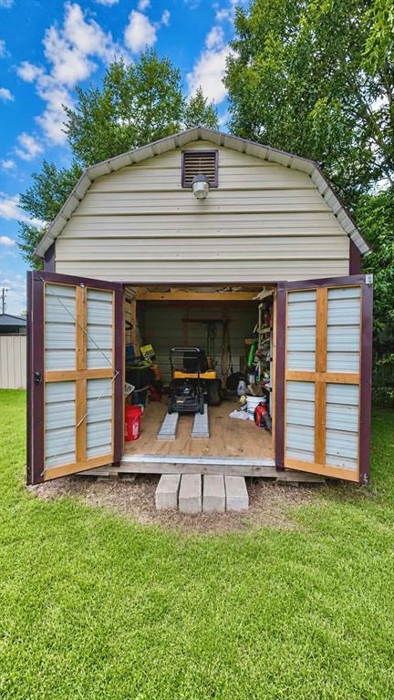 741 Waterfront Row Quitman, TX 75783 - Photo 25 of 40 a view of a house with a porch and furniture