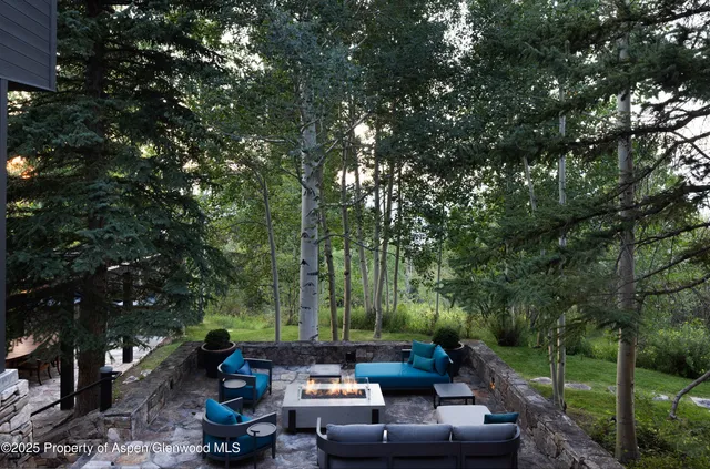 a view of a town with mountains in the background