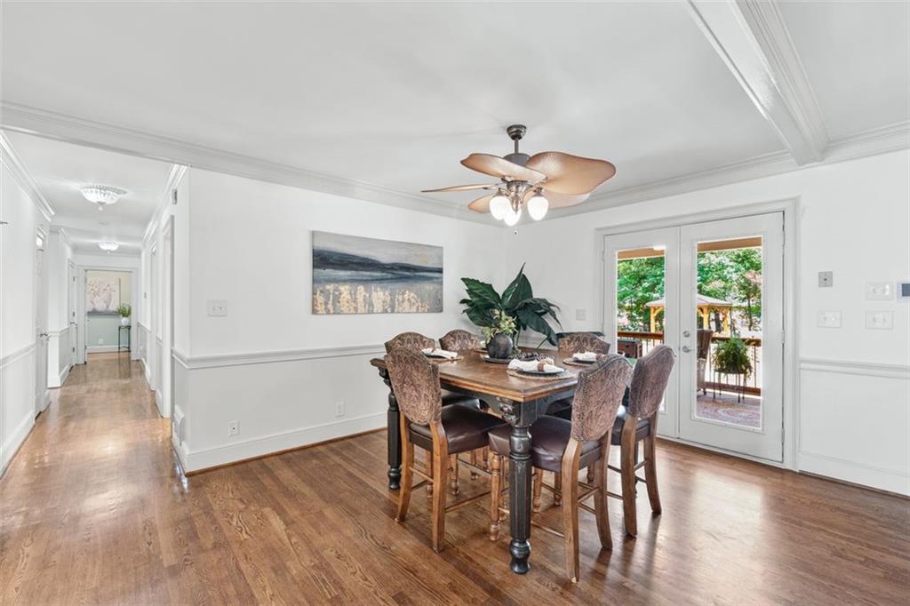 2065 Innsfail Drive Snellville, GA 30078 - Photo 13 of 67 a view of a dining room with furniture window and wooden floor