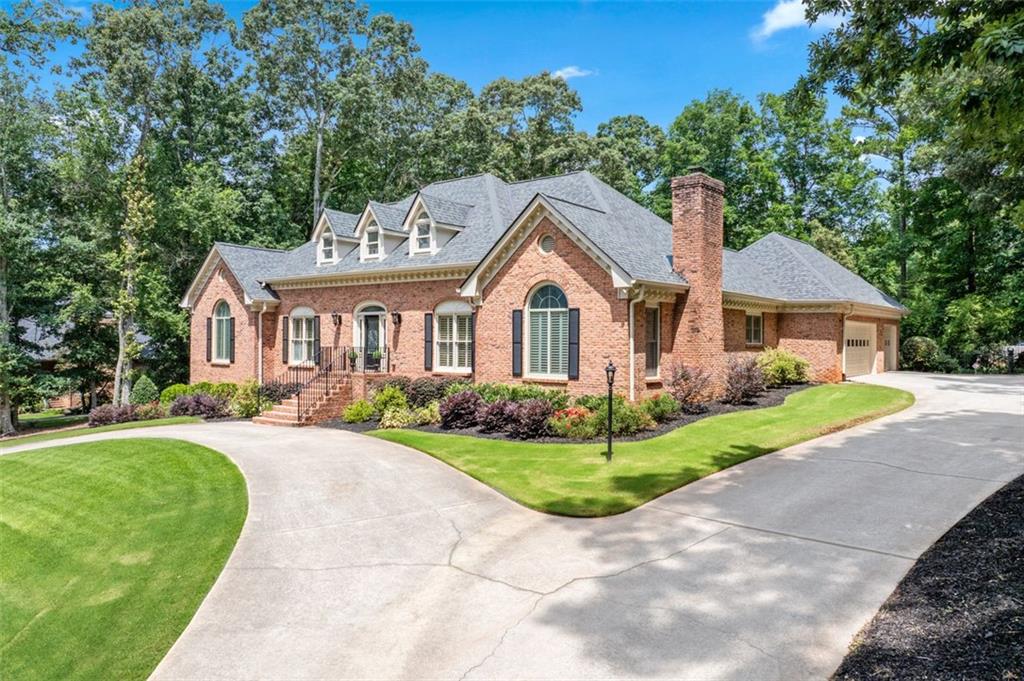 2065 Innsfail Drive Snellville, GA 30078 - Photo 3 of 71 a front view of a house with a yard