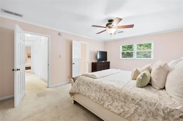 a bathroom with a double vanity sink mirror and double
