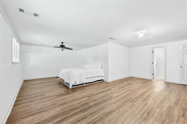 a view of a house with swimming pool and sitting area