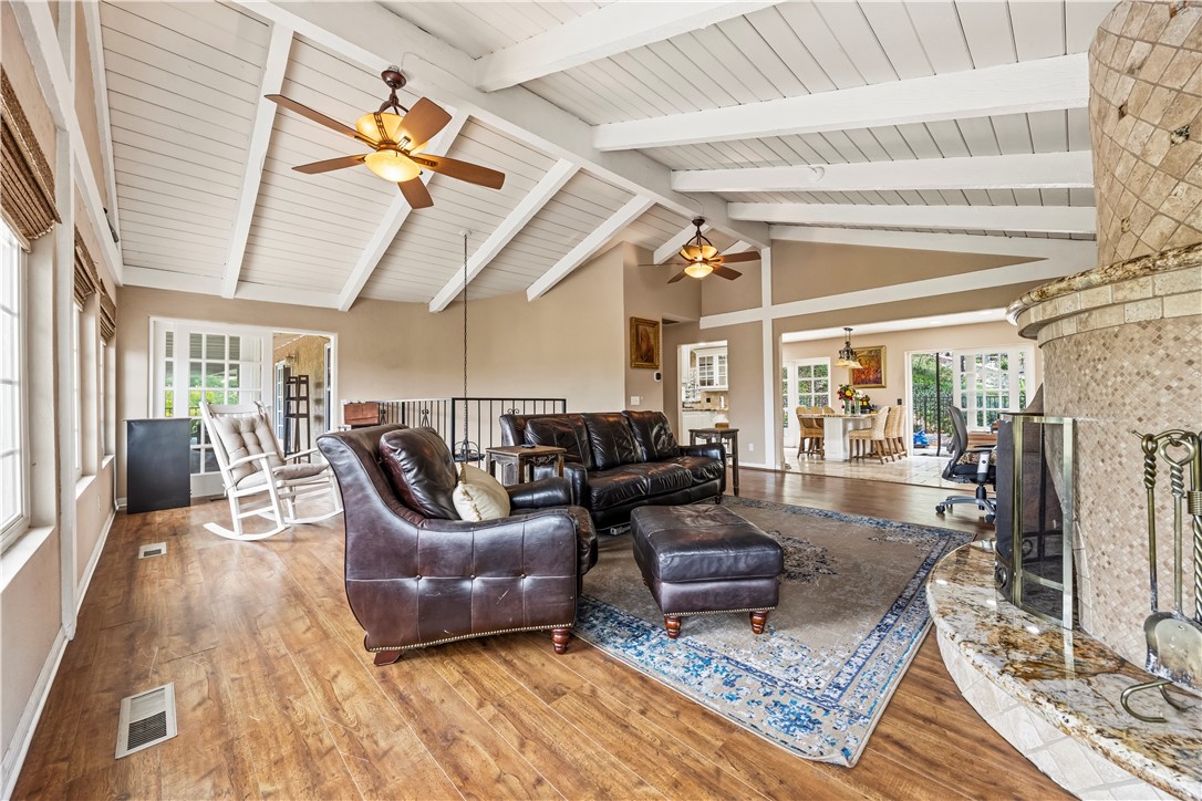 1485 Vía Ladera Fallbrook, CA 92028 - Photo 8 of 43 a living room with furniture and a rug