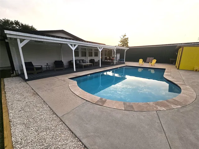 a view of outdoor space yard and swimming pool