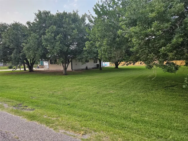 a view of balcony with wooden floor