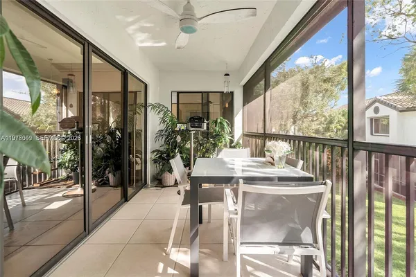 a view of a dining room with furniture window and outside view