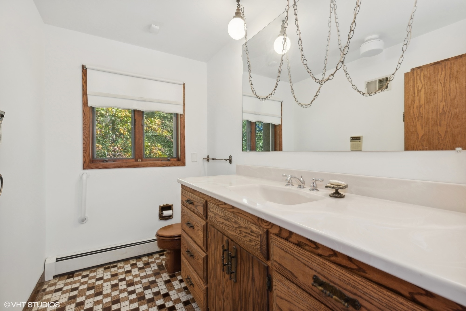 27721 South Klemme Road Crete, IL 60417 - Photo 18 of 28 a bathroom with a sink and a mirror