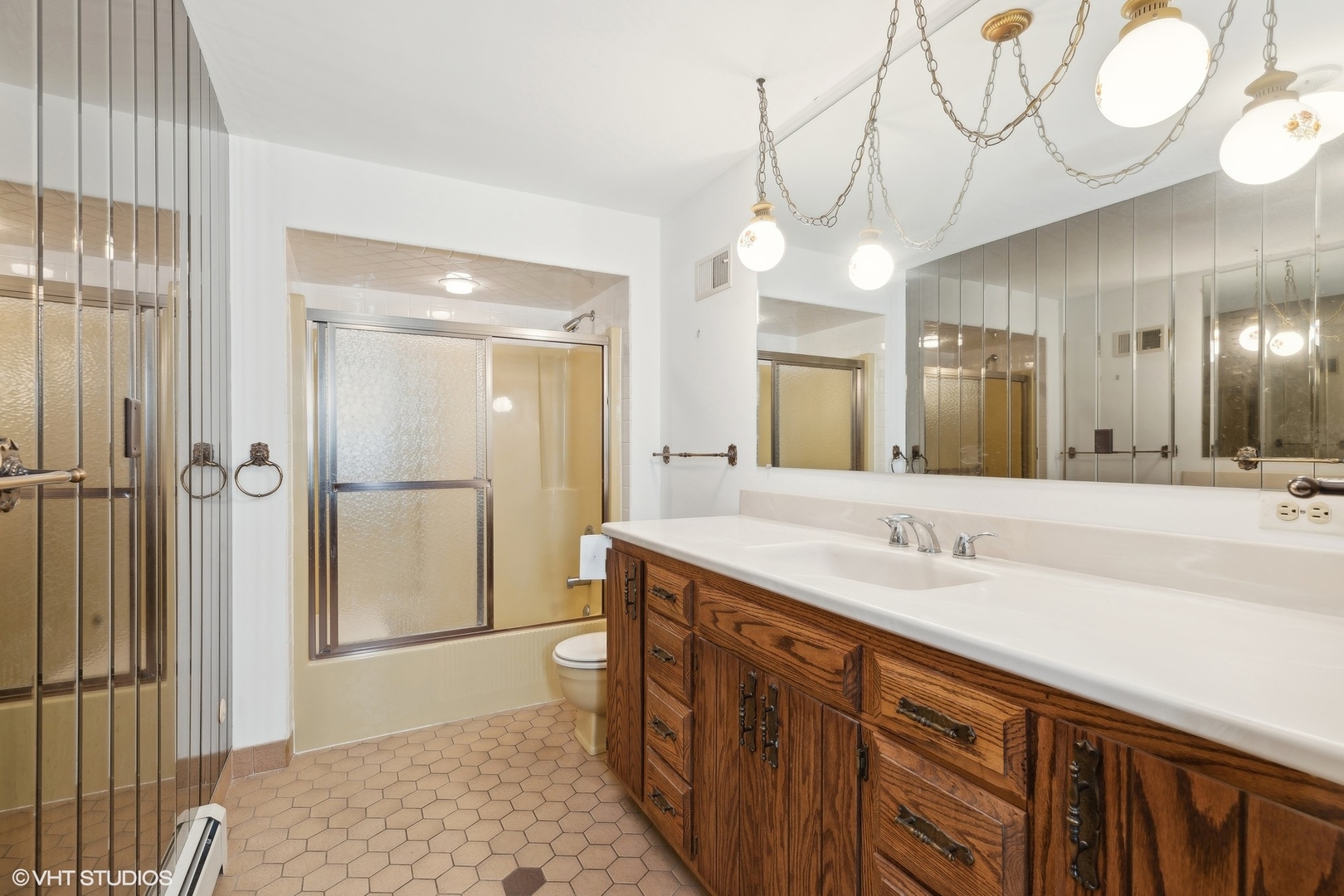 27721 South Klemme Road Crete, IL 60417 - Photo 19 of 28 a spacious bathroom with a double vanity sink and a mirror