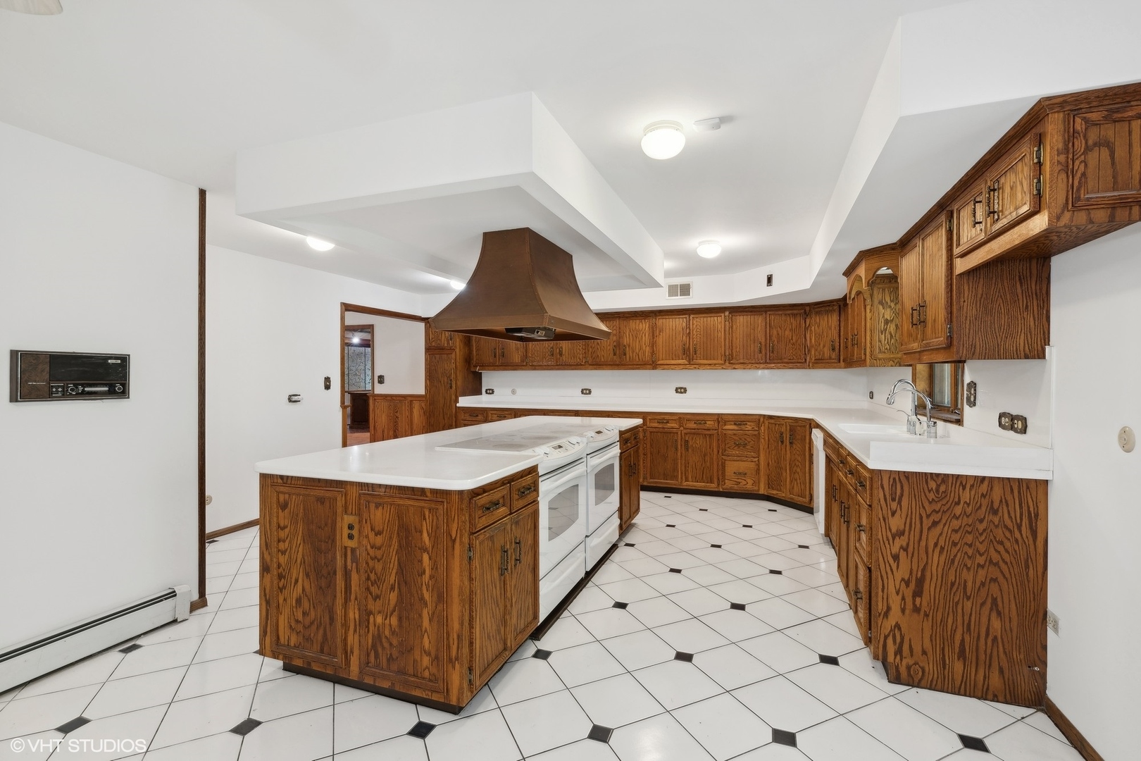 27721 South Klemme Road Crete, IL 60417 - Photo 9 of 28 a kitchen with stainless steel appliances a sink stove and cabinets