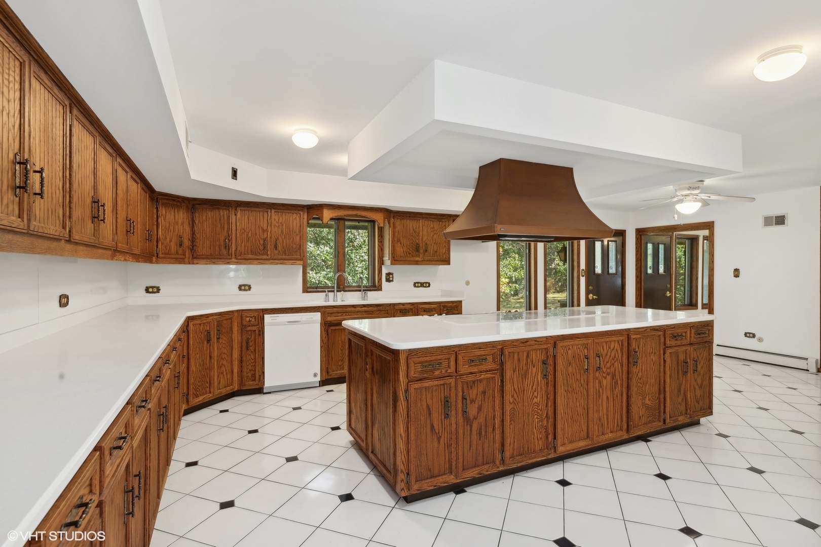 27721 South Klemme Road Crete, IL 60417 - Photo 10 of 28 a kitchen with a stove a sink a refrigerator and cabinets