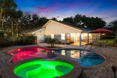 a view of swimming pool from a balcony