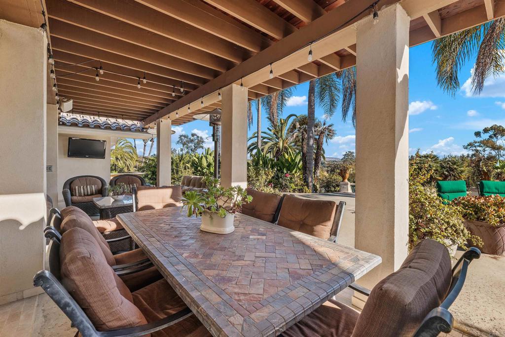 16346 Via Del Alba Rancho Santa Fe, CA 92067 - Photo 24 of 34 a view of a dining room with furniture