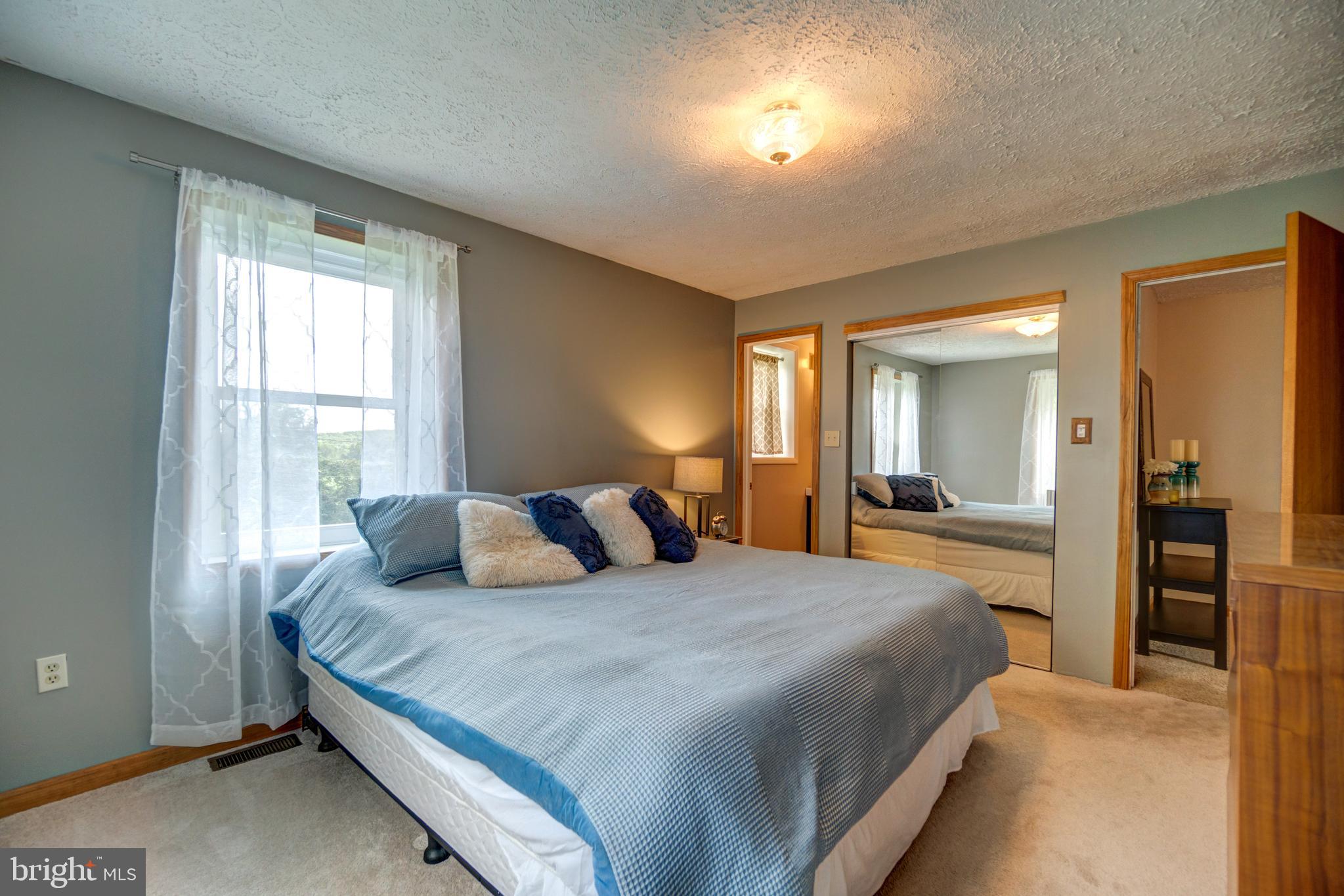 1312 Heaps Road Street, MD 21154 - Photo 22 of 51 Master bedroom off living room with KING bed