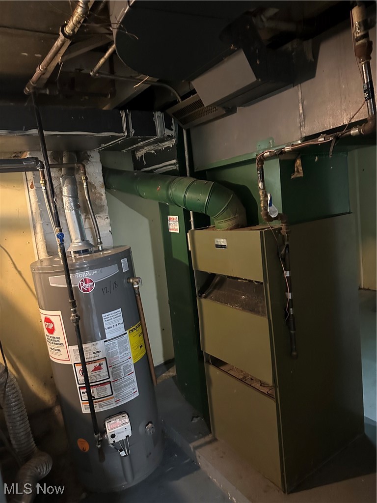 1596 Wood Road Cleveland Heights, OH 44121 - Photo 22 of 25 Utilities featuring water heater and heating unit