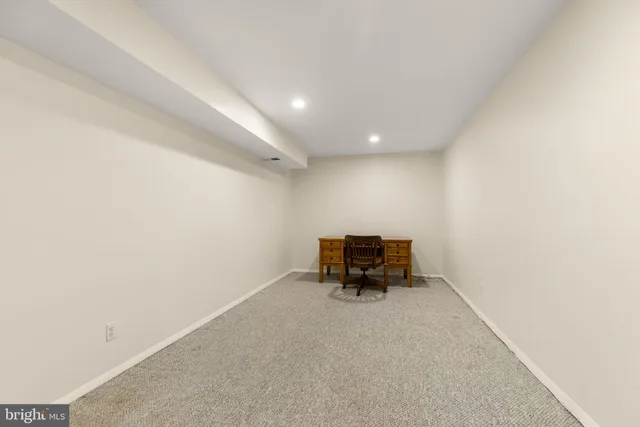 a view of balcony with wooden floor and outdoor seating