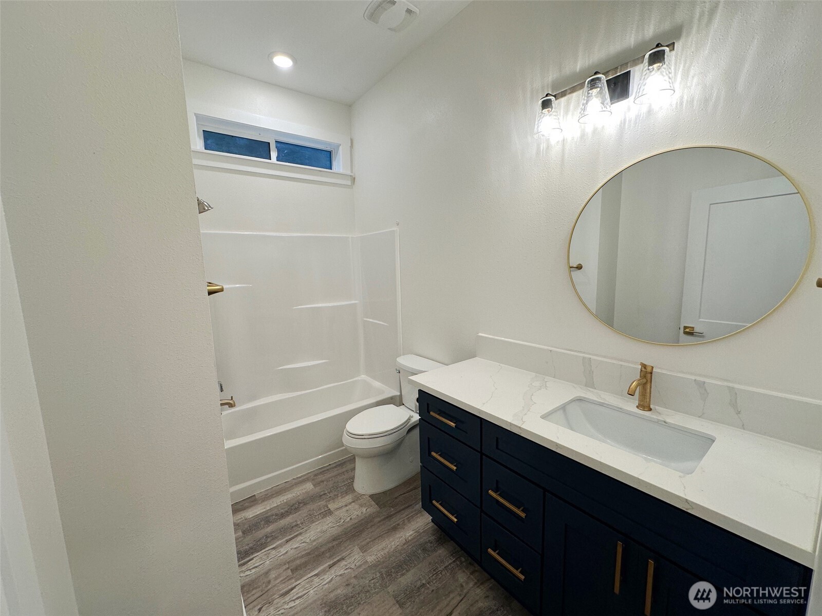 559 Upper Naselle Road Naselle, WA 98638 - Photo 19 of 32 a bathroom with a sink a toilet and a mirror