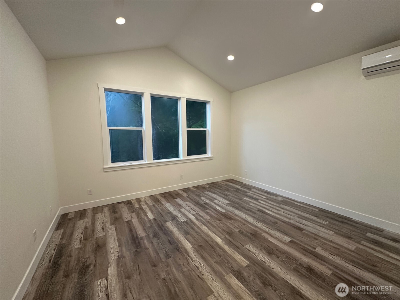 559 Upper Naselle Road Naselle, WA 98638 - Photo 21 of 32 a view of empty room with wooden floor