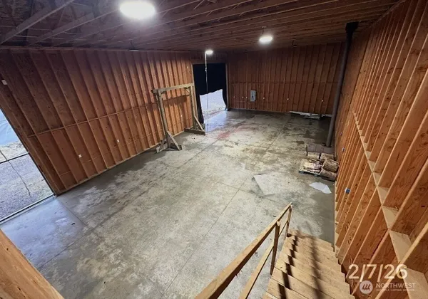 a room with furniture and gym equipment