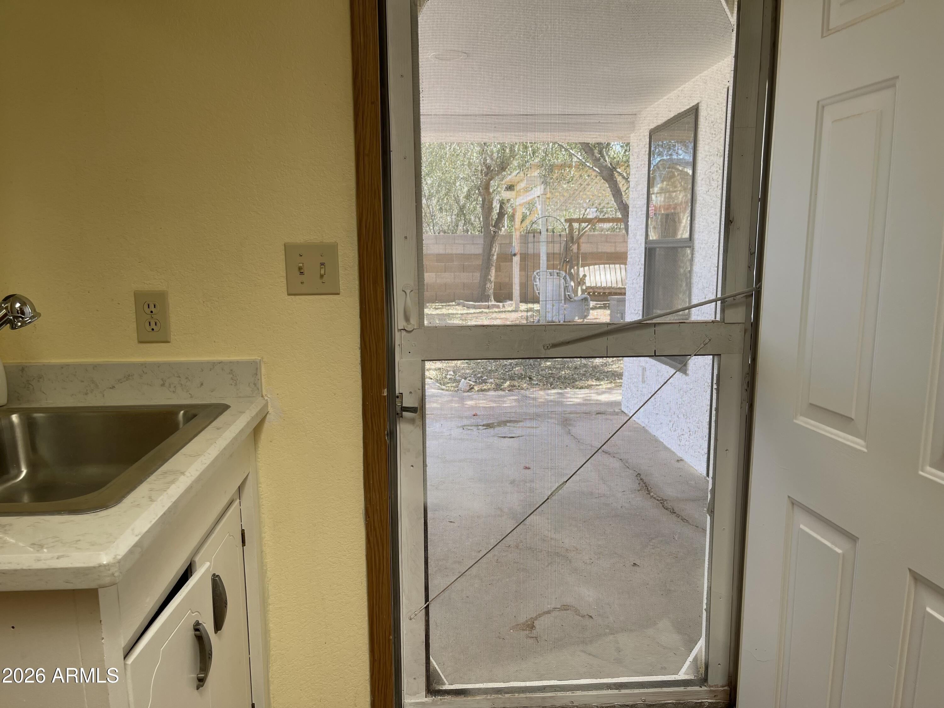 14555 South Acapulco Road Arizona City, AZ 85123 - Photo 34 of 46 Back door to yard