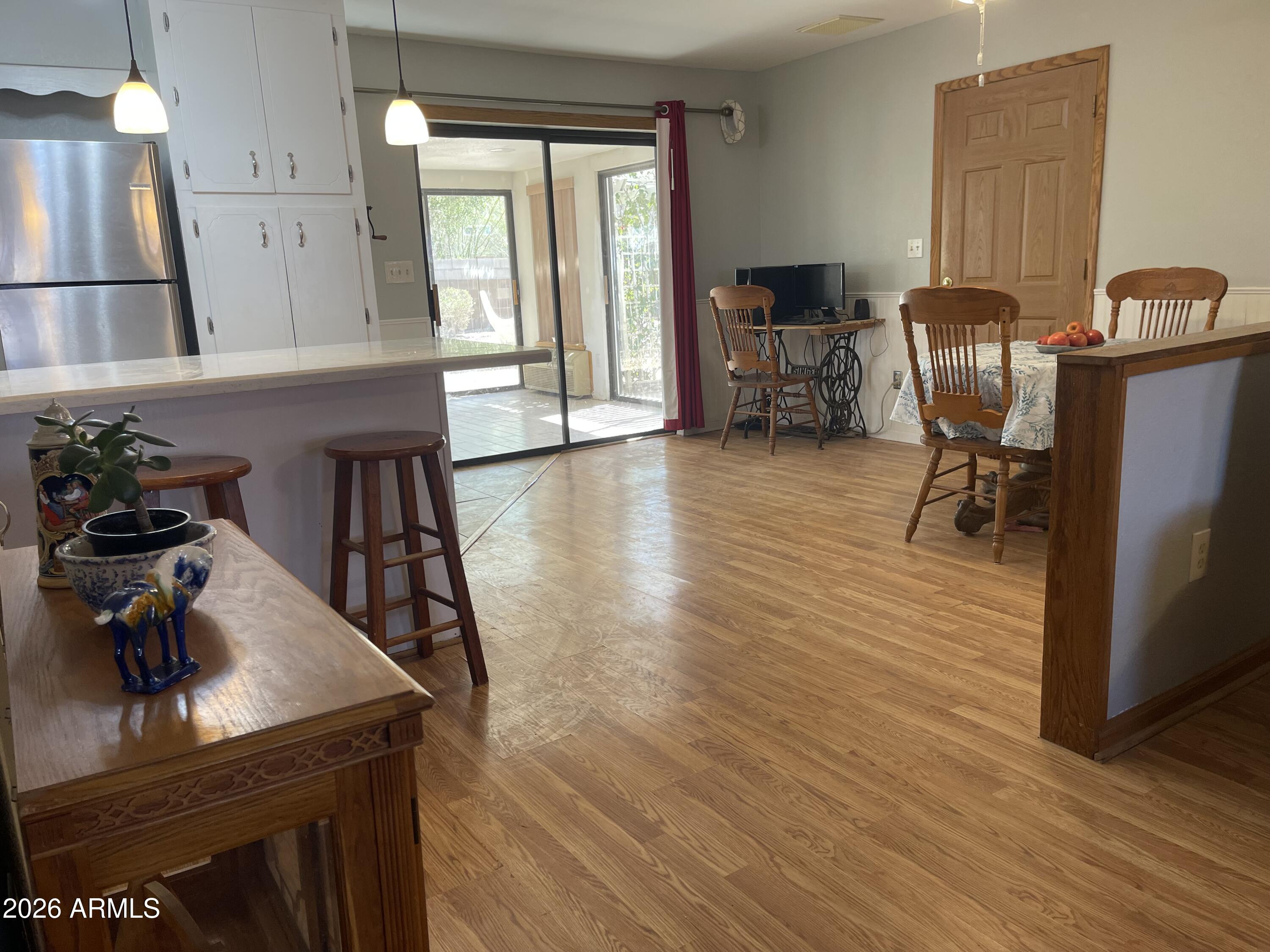 14555 South Acapulco Road Arizona City, AZ 85123 - Photo 6 of 46 Living room to kitchen