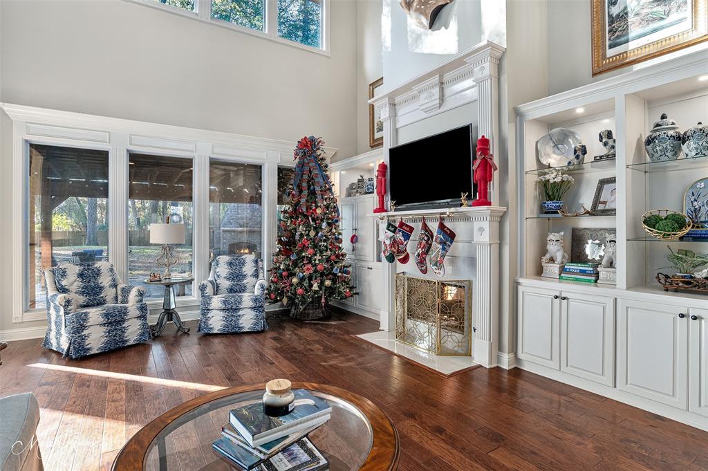 1310 Bay Ridge Drive Bossier City, LA 71111 - Photo 18 of 37 a living room with fireplace furniture and a flat screen tv