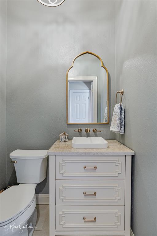 1310 Bay Ridge Drive Bossier City, LA 71111 - Photo 20 of 37 a bathroom with a toilet sink and mirror