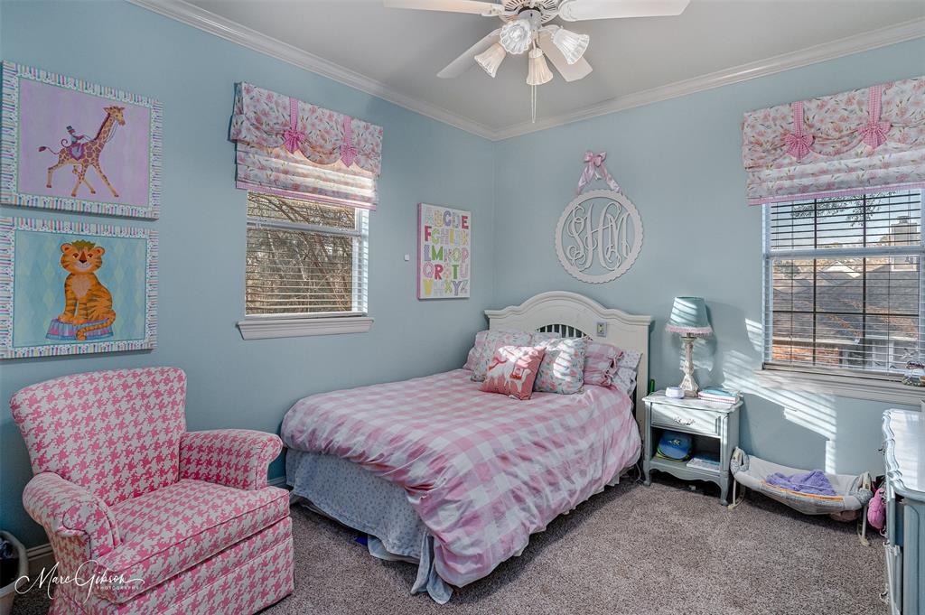1310 Bay Ridge Drive Bossier City, LA 71111 - Photo 31 of 37 a bedroom with a bed couch and a window
