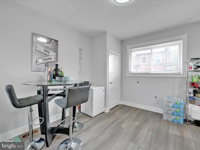 a workspace with furniture and wooden floor