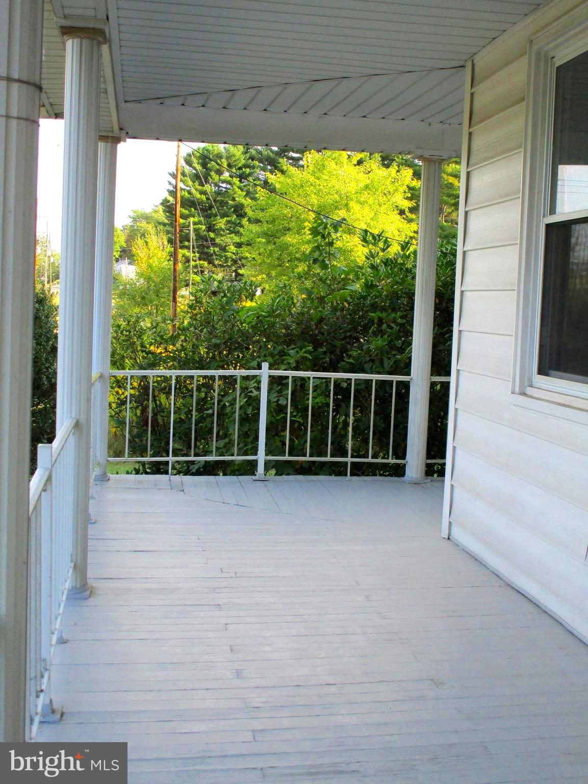 12104 Messick Road Southeast Cumberland, MD 21502 - Photo 4 of 26 Wrap-around Porch