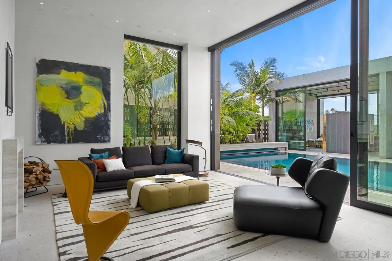 1228 Park Row La Jolla, CA 92037 - Photo 13 of 35 a living room with furniture and a large window