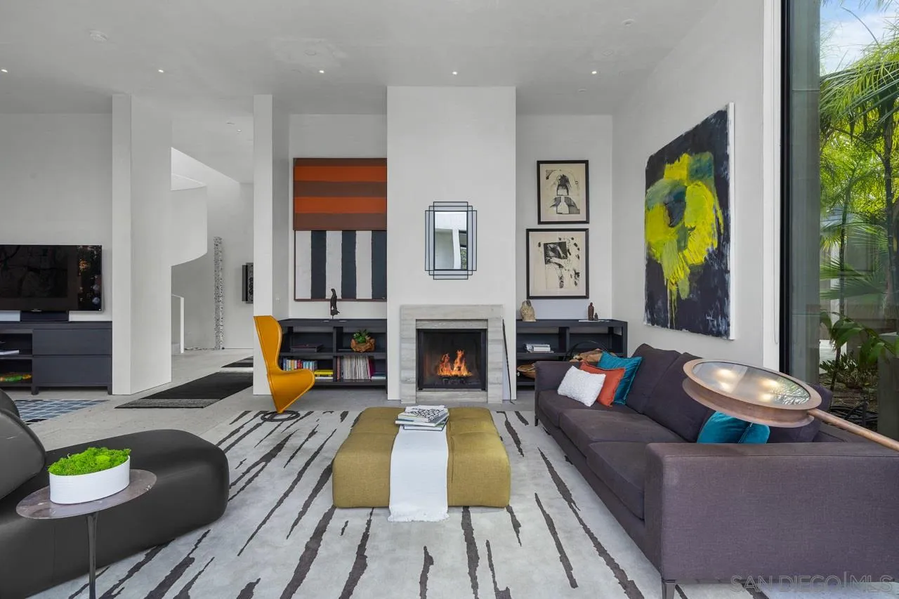 1228 Park Row La Jolla, CA 92037 - Photo 14 of 35 a living room with furniture fireplace and flat screen tv