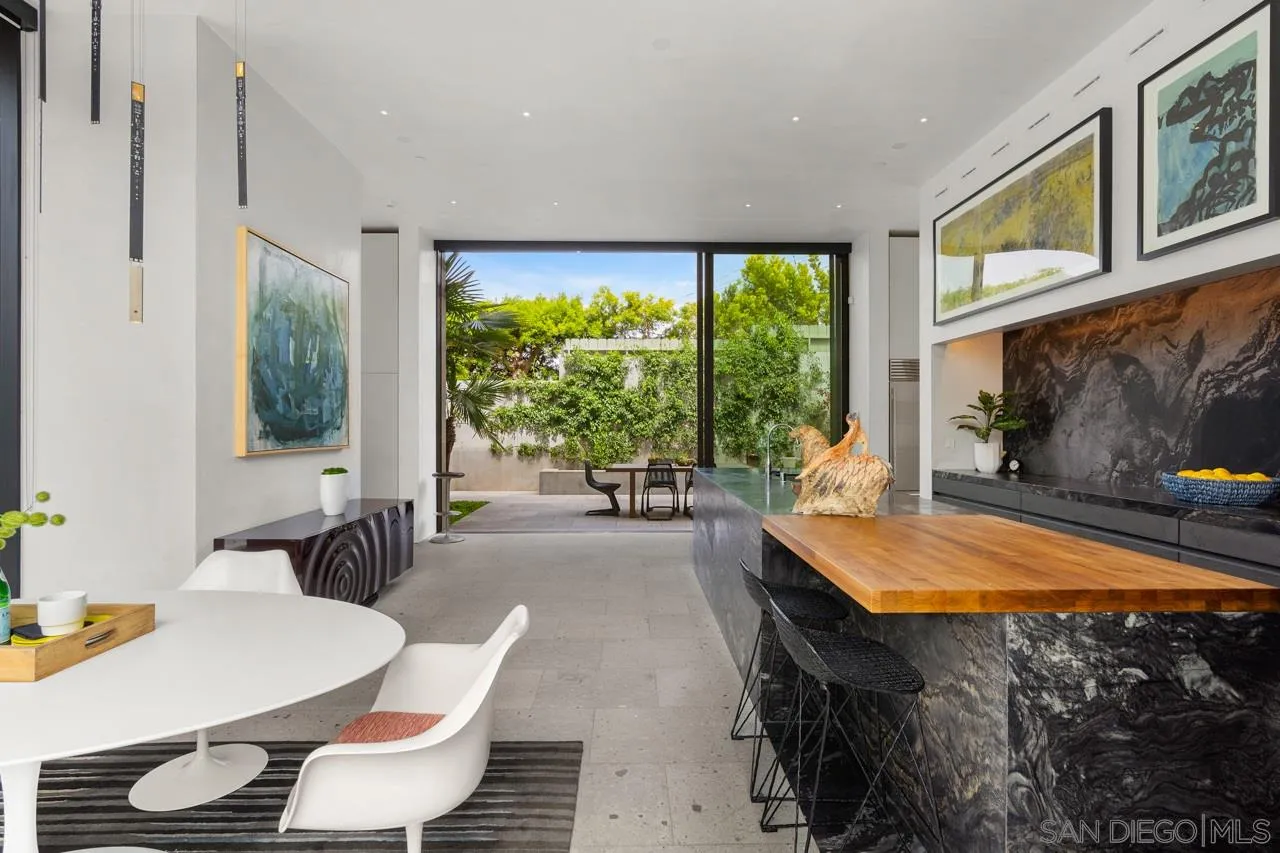 1228 Park Row La Jolla, CA 92037 - Photo 8 of 35 a room with patio furniture and a large window