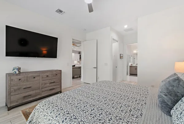 a bathroom with a glass shower door