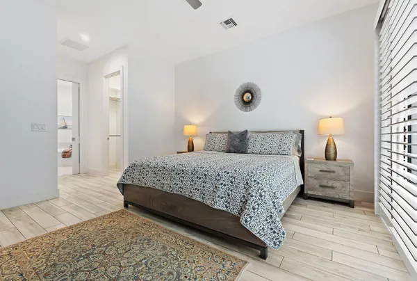 a kitchen with a sink cabinets and window