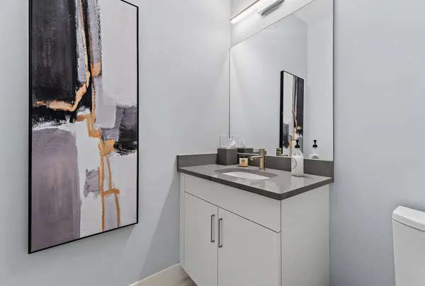a view of a house with backyard porch and sitting area