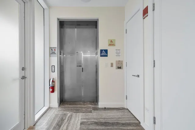 a swimming pool with outdoor seating and yard