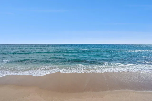 a view of a city with an ocean