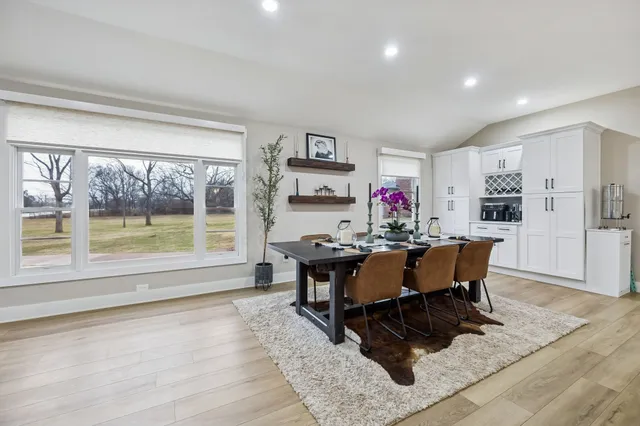 a kitchen with a sink a stove and refrigerator