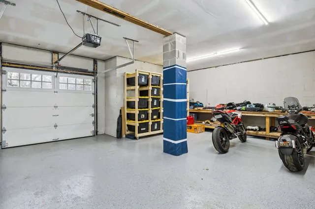 a view of a house with backyard porch and sitting area