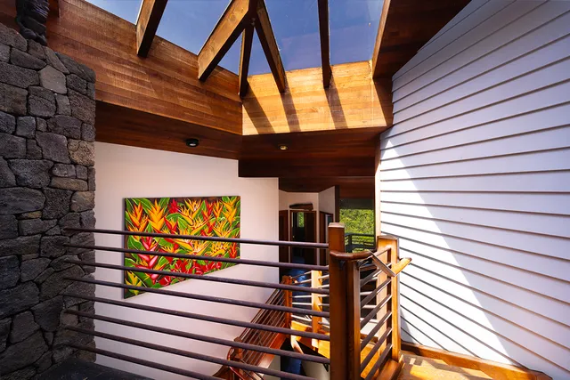 a view of a balcony with a potted plant