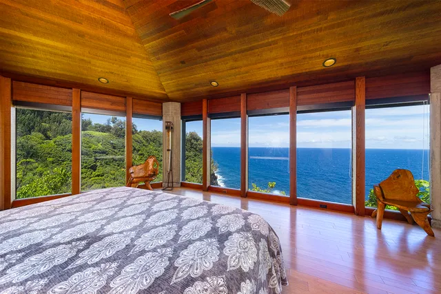 a view of an empty room with a large window