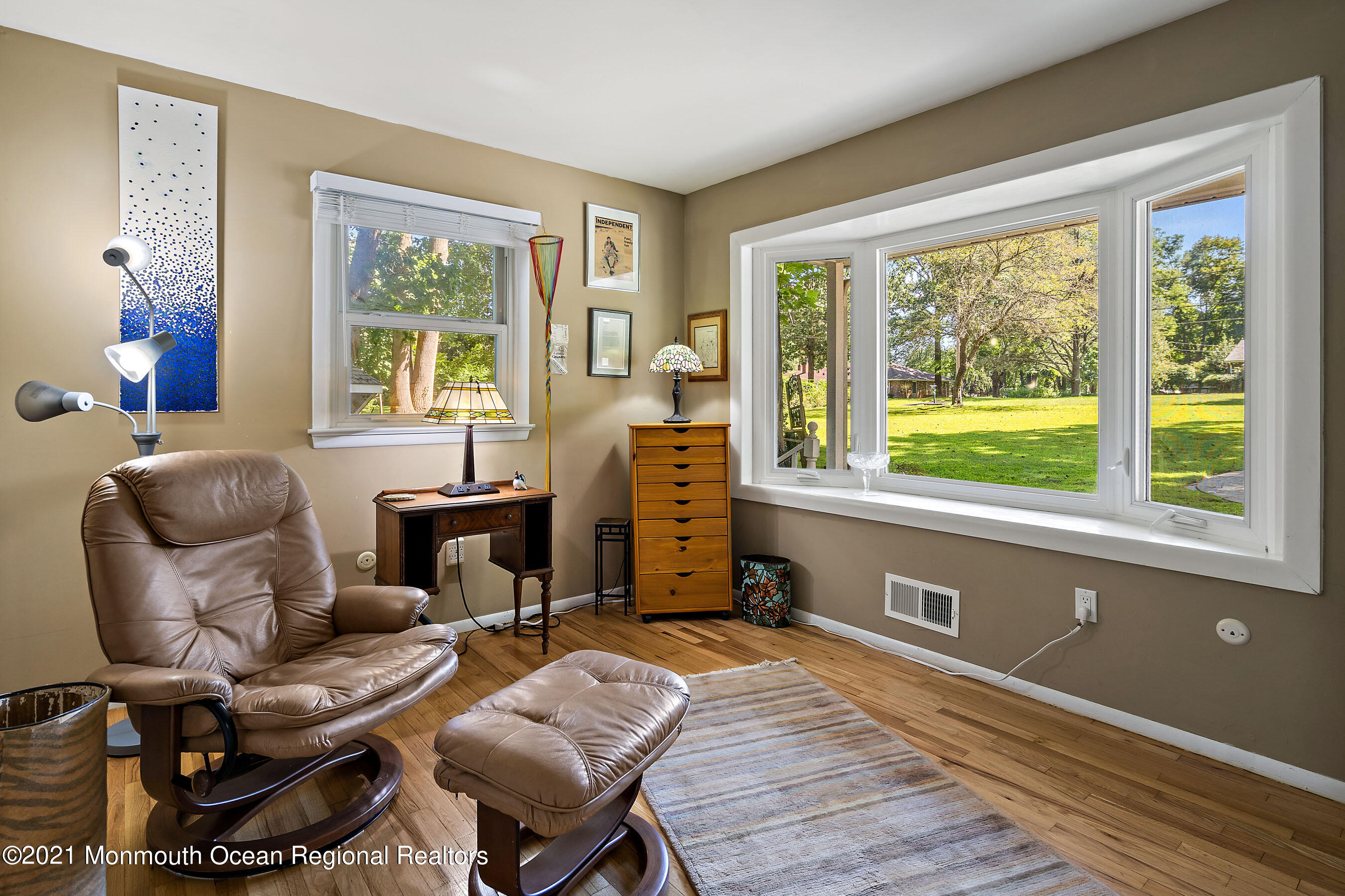 88 Beechwood Road Lincroft, NJ 07738 - Photo 16 of 33 a living room with furniture and a window