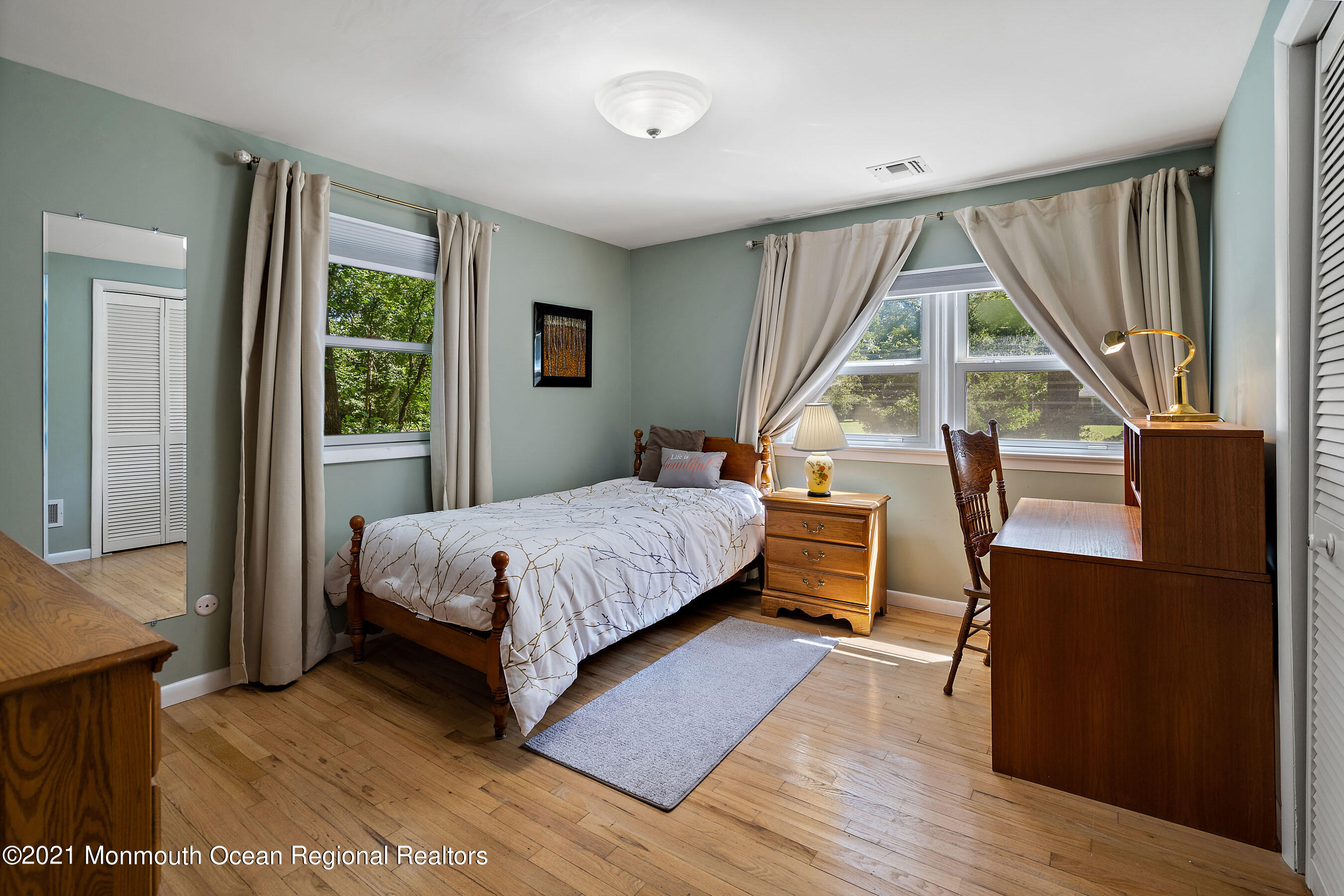 88 Beechwood Road Lincroft, NJ 07738 - Photo 23 of 33 a bedroom with a bed and a large window