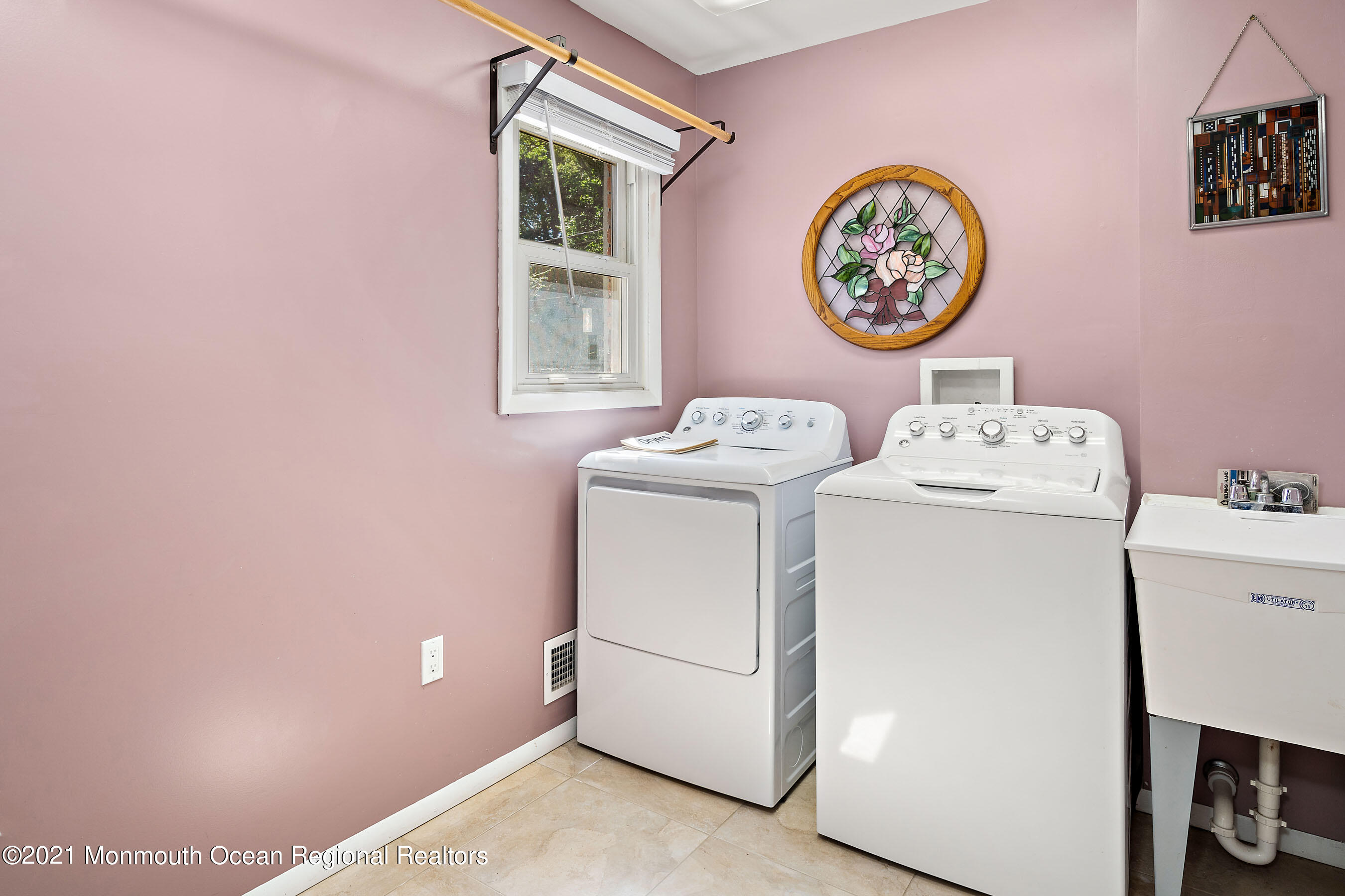 88 Beechwood Road Lincroft, NJ 07738 - Photo 30 of 33 a utility room with dryer and washer