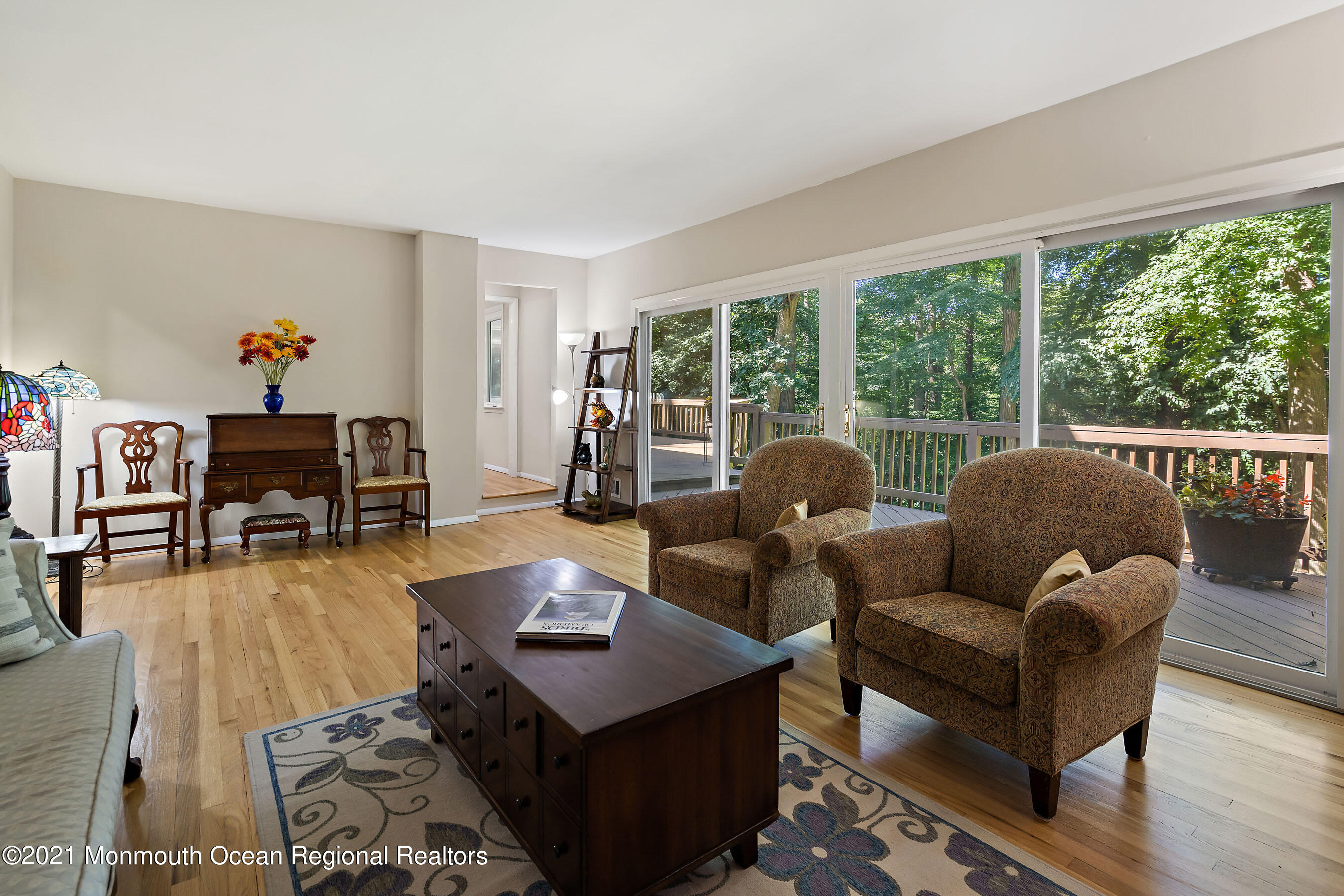 88 Beechwood Road Lincroft, NJ 07738 - Photo 6 of 33 a living room with furniture and a large window