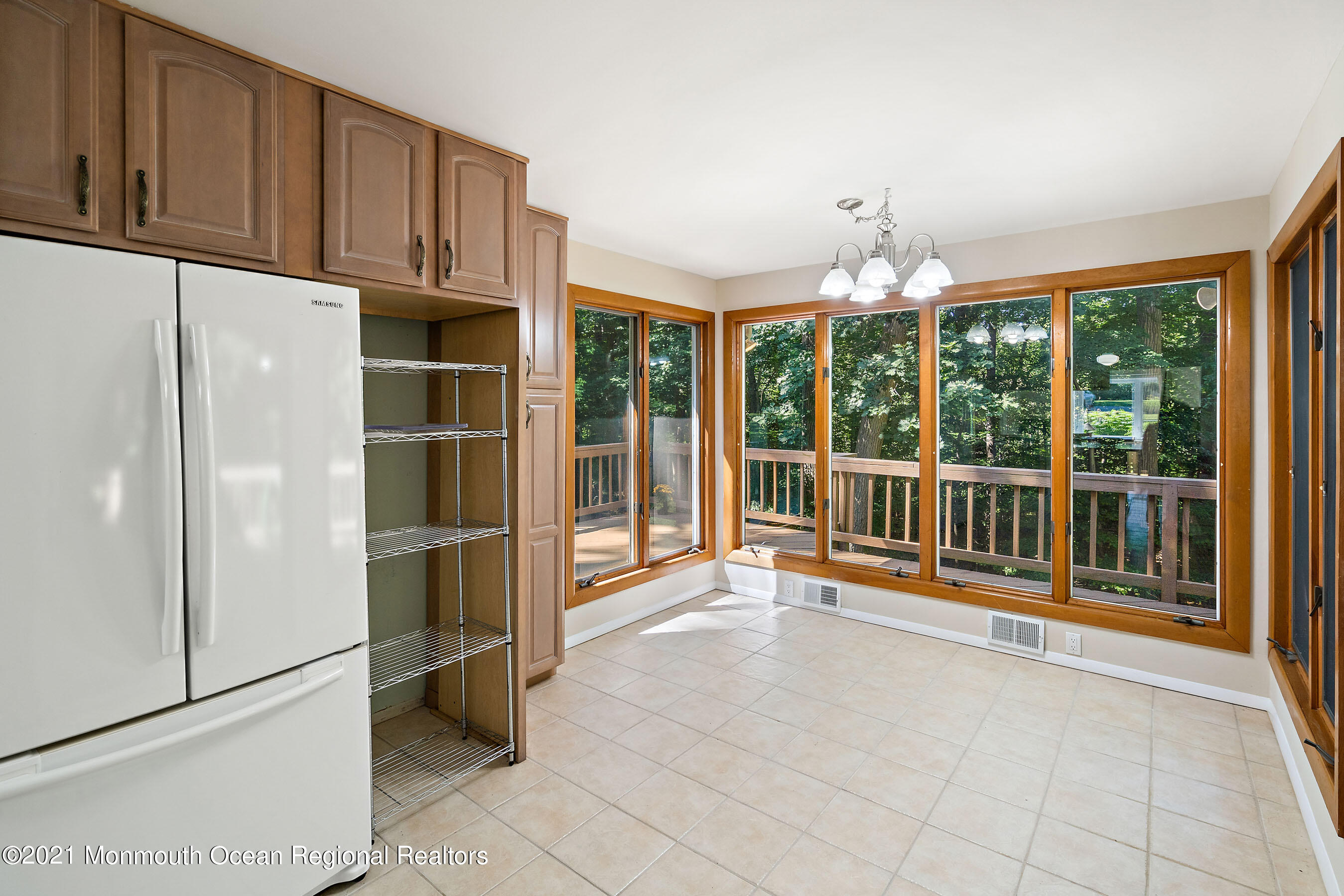 88 Beechwood Road Lincroft, NJ 07738 - Photo 10 of 33 a view of a room with a large window