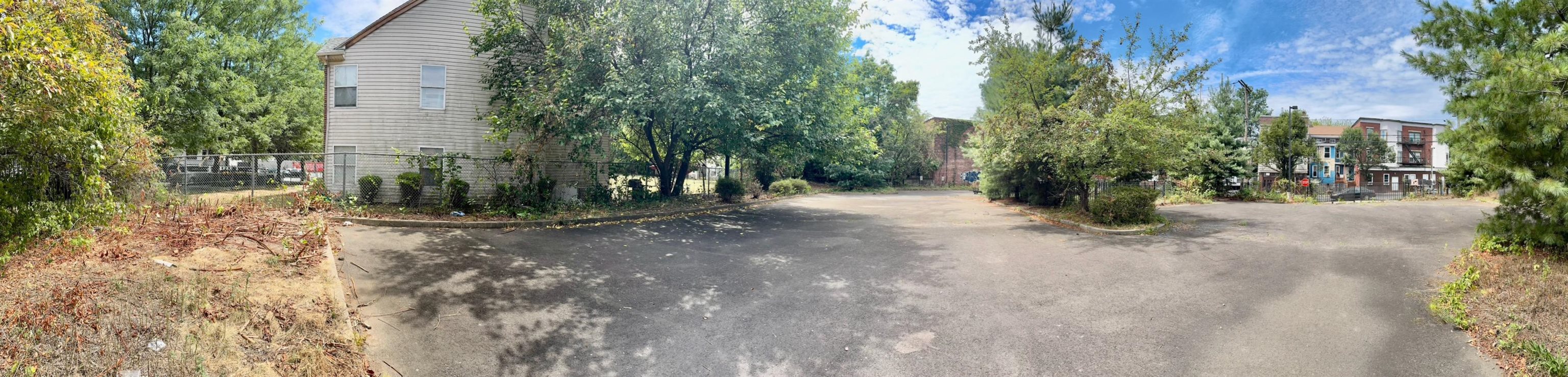 66-68 North Main Street Paterson, NJ 07522 - Photo 5 of 5 a view of a yard with plants and trees