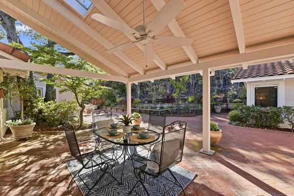 a patio with patio outdoor seating and yard