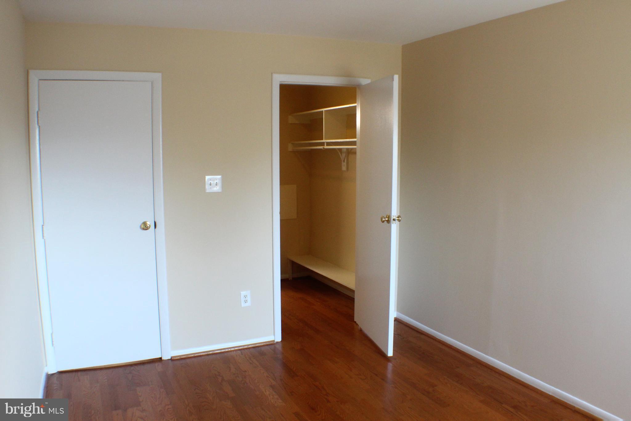 5816 Royal Ridge Drive, Unit D Springfield, VA 22152 - Photo 12 of 15 wooden floor in an empty room